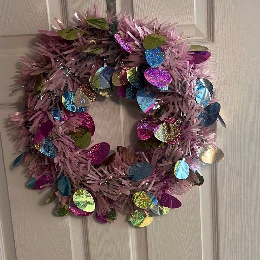Festive Pink Holiday Wreath with Multicolor Accents